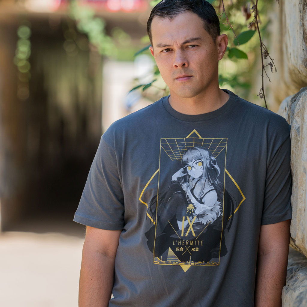 Photograph of a man wearing the Persona 5 Futaba tee. He is standing in front of a tunnel that has plants growing all around it.