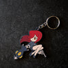 Skullgirls Parasoul keychain shown on carbon case top with scratches on it with nice window lighting coming from the top left of the frame.